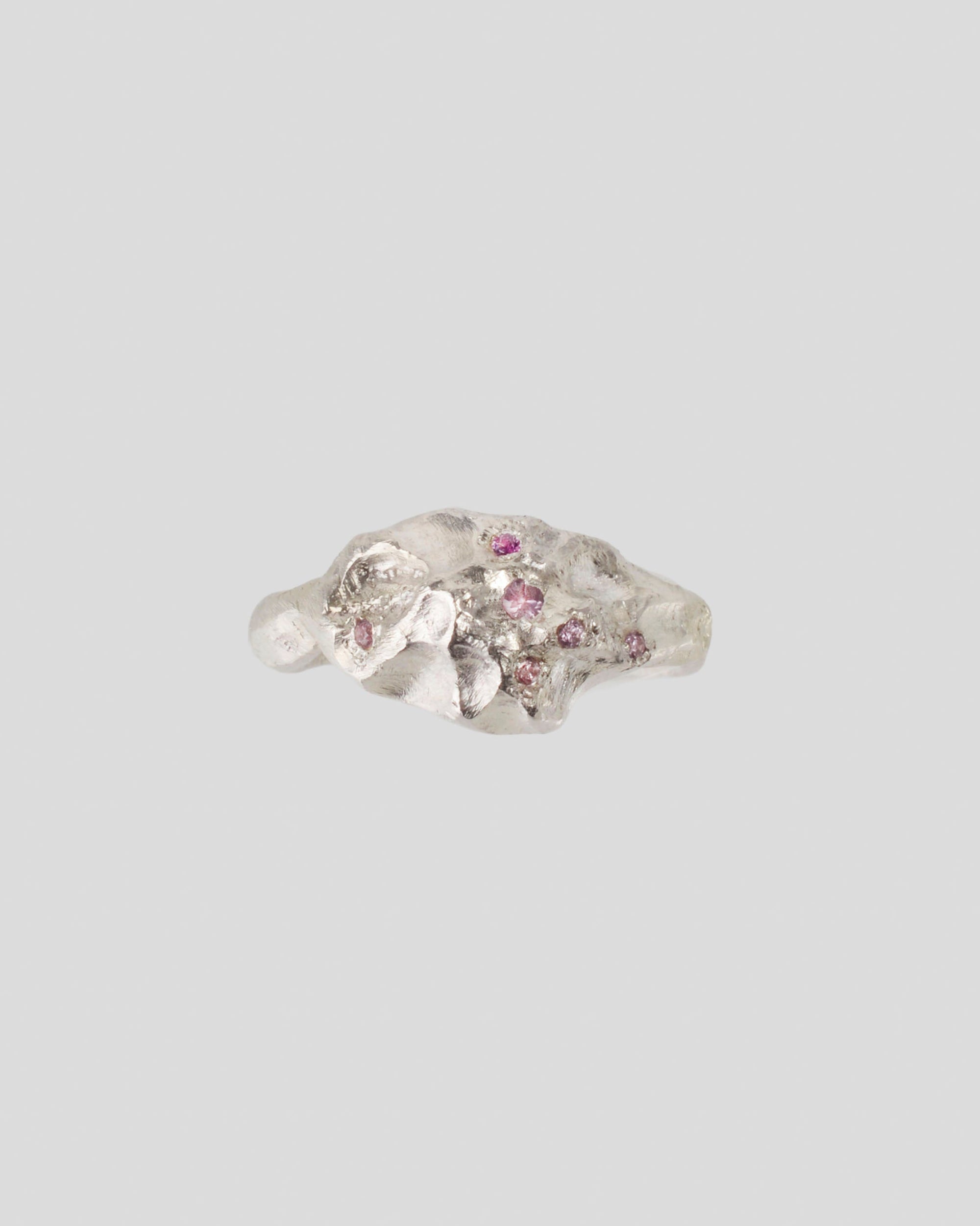 Pink sapphire ring in sculptural silver – handmade molten jewelry