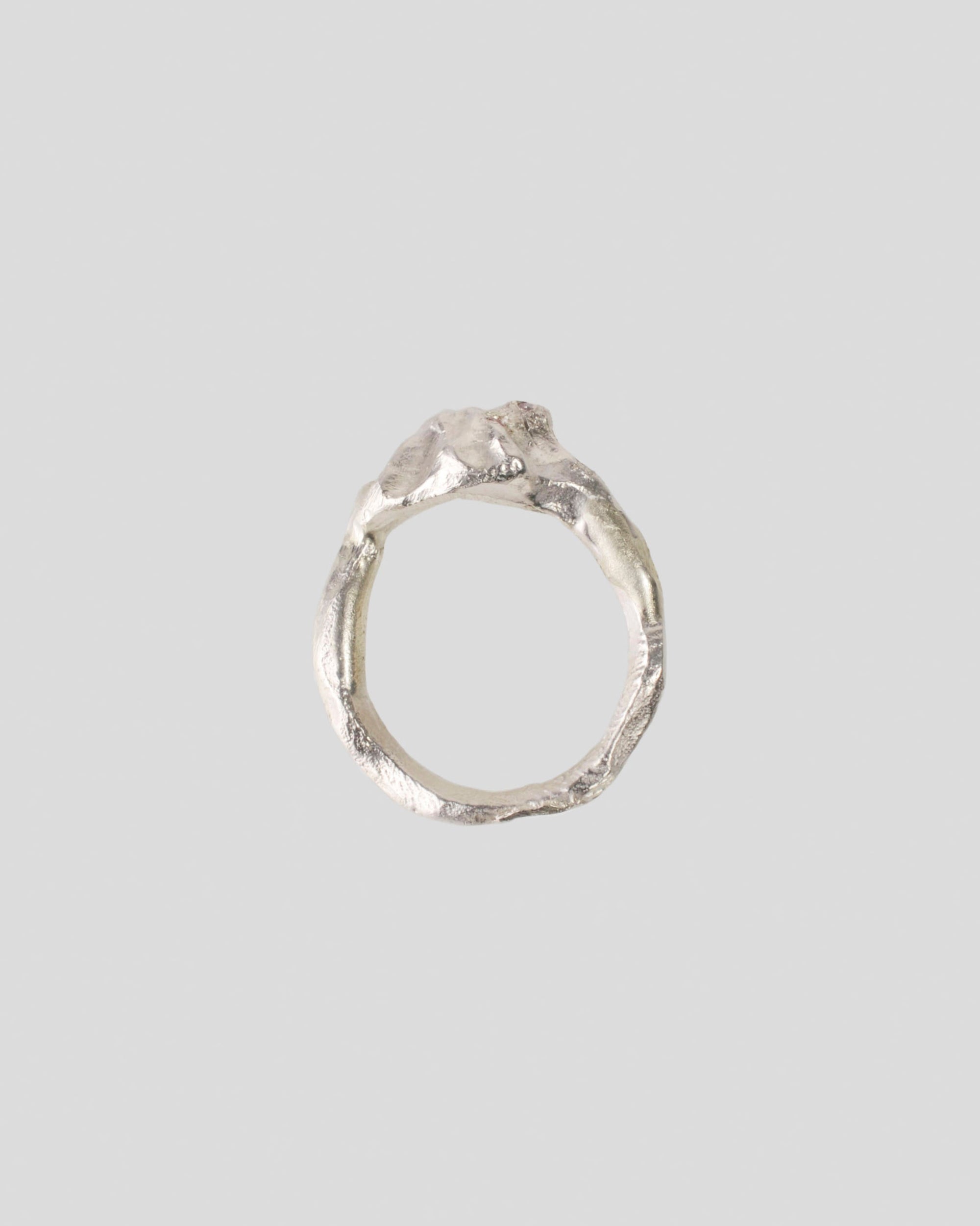 Raw silver ring with pink gemstone – organic form