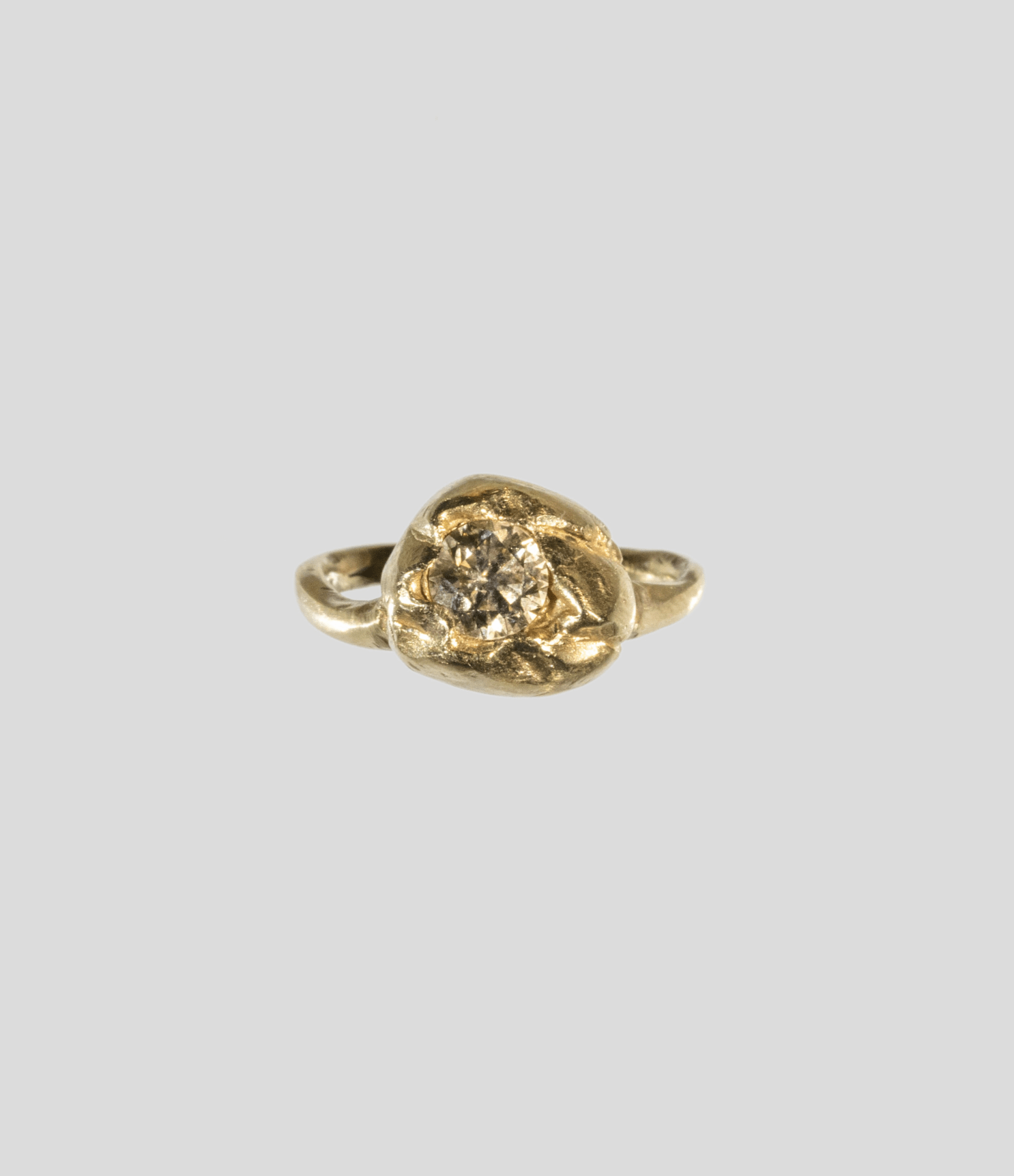 handcrafted solitaire engagement rings in 18k gold